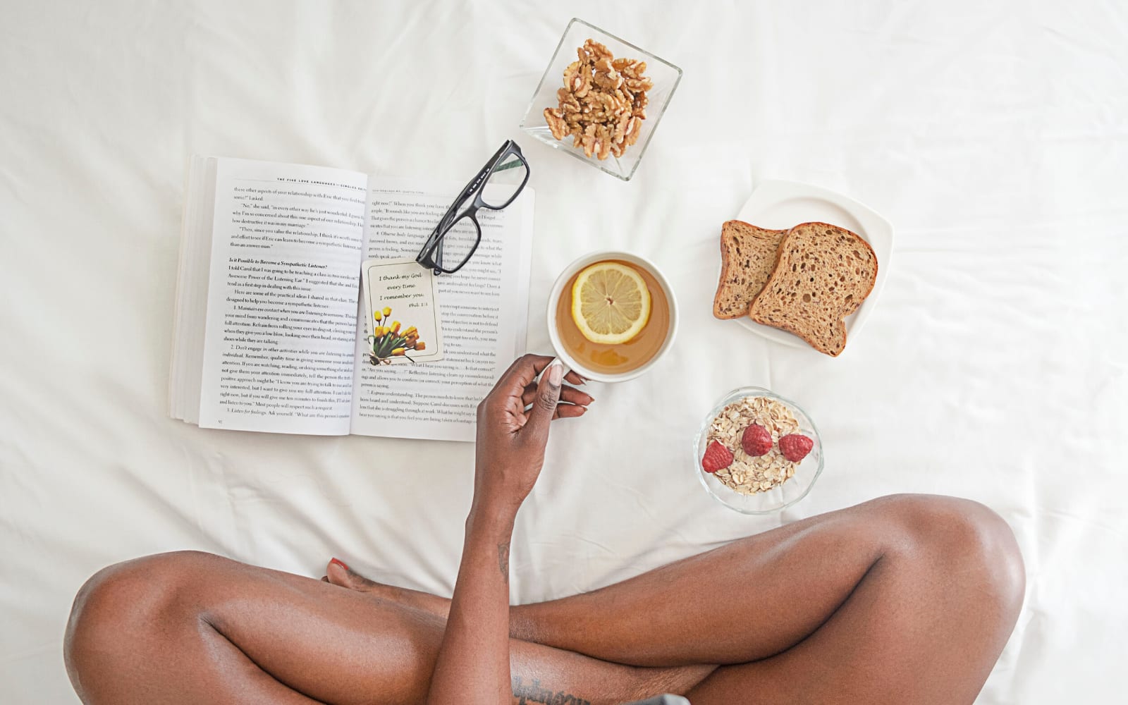 Woman eating and studying in the morning.
